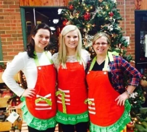 Waitresses dressed up as elves for holidays