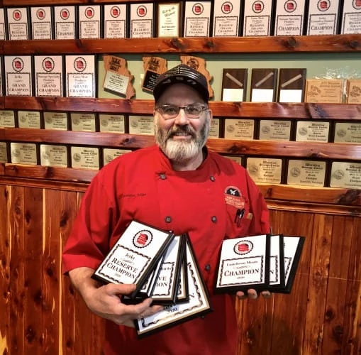 Mike Sloan Holding plaques