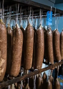 Hanging Sausages in a fridge