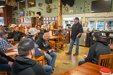 Mike the Wurstmeister giving a lecture about bacon